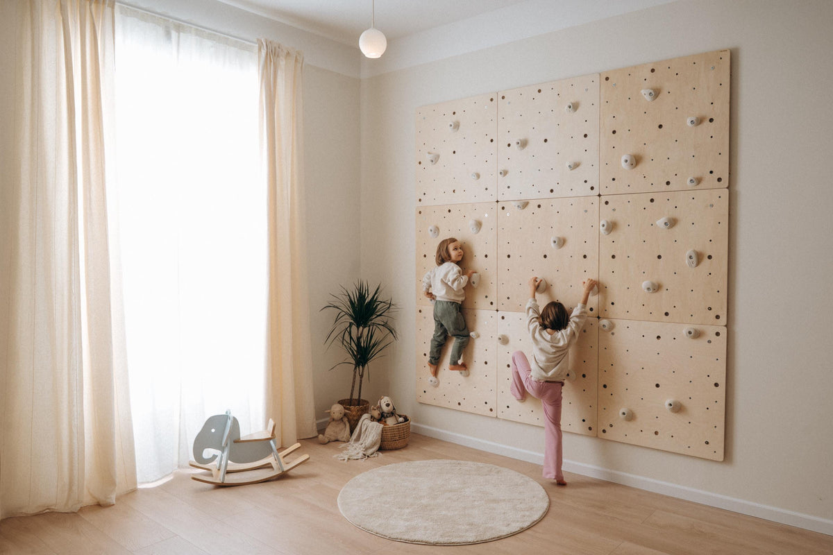 Large indoor climbing wall made of birch plywood panels