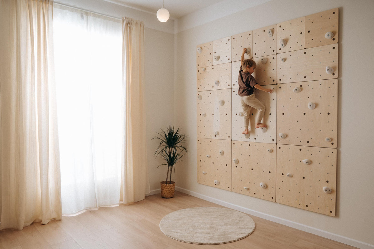 Climbsy indoor climbing wall made of S size birch plywood panels with white holds